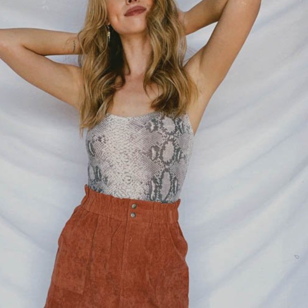Vestique snakeskin body suit